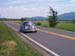 Blue Mini Cooper Pickup on the road